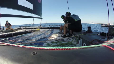 Sailors get ready on foiling catamaran GC32 before regatta Stock Footage 56281623