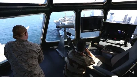 Sailors looking out from conning tower from French ship Tonnerre Video stock 83580400