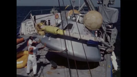 Sailors lower Apollo 8 command module onto motor vessel Video stock 271517140