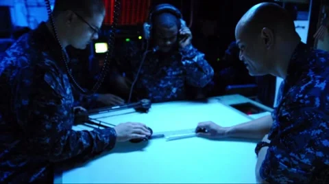 Sailors Plot Course on US Navy Vessel Stock Footage 56441228