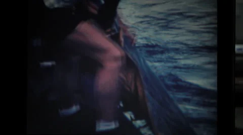 Sailors pulling out lifeboat from the ocean Stock Footage 37597163