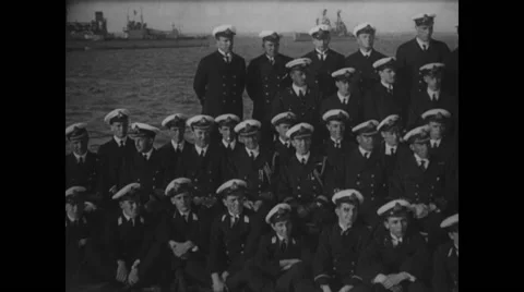 Sailors sitting on harbour Stock Footage 43335251