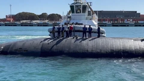 Sailors standing on hull of fast-attack submarine USS Annapolis (SSN 760) Stock Footage 267835472