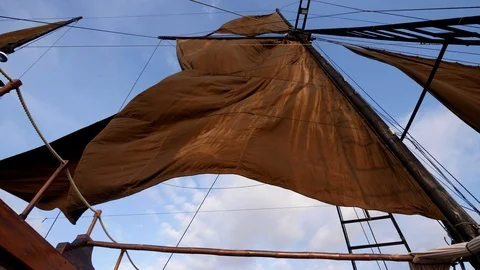 Sails of phinisi boat in the process of being put on Video stock 112483791
