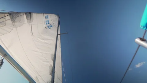 Sails of a sailing yacht in the wind Stock Footage 128395870