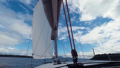 Sails waver in the wind, sailing boat movements along the sea in Norway. Mast Stock Footage 84827927