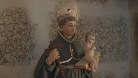 Saint Anthony Statue Embracing Child Jesus with Cross Stock Footage 320161197