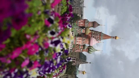 Saint Basil's Cathedral over blooming flowers Stock Footage 281815385