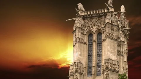 Saint-Jacques Tower (Tour Saint-Jacques) against the sunset. Paris, France Stock Footage 265843246