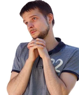 Saint looking man praying for something Stock Photos