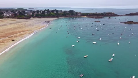 Saint-Lunaire Pointe du Decolle bay with turquoise water and moored sailboats Stock Footage 342340851