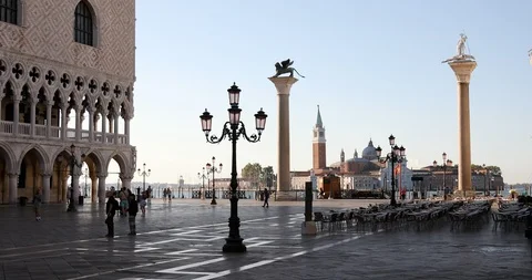 Saint Mark square and column with lion statue, sunrise in Venice, Italy Stock Footage 125764611