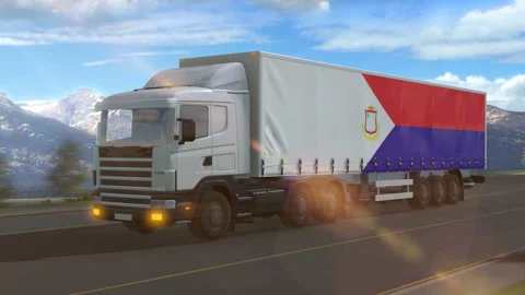 Saint Martin flag shown on the side of a large truck Stock Footage 122105477