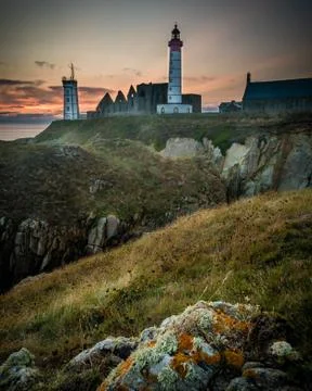 Saint Mathieu lighthouse in Brittany at sunset in France Stock Photos