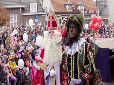 Saint Nicholas and Black Pete Netherlands meeting children Stock Footage 69511754