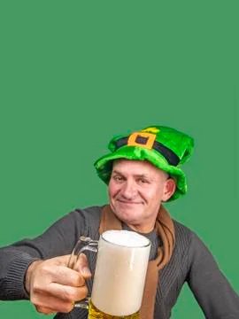 Saint Patrick with a beer in his hand. Stock Photos