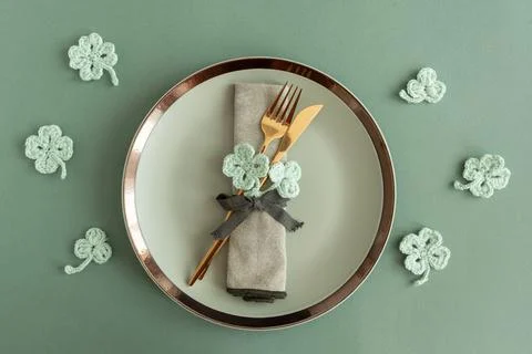 Saint Patrick Day Table Setting with Clover Decor. Festive Green Arrangement Stock Photos
