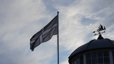Saint Piran Cornwall flag waving in the wind, in slow motion. Kernow flag Stock Footage 255050252