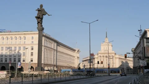 Saint Sofia Monument with Parliament Building and street traffic,Sofia,Bulgaria Stock Footage 152908112