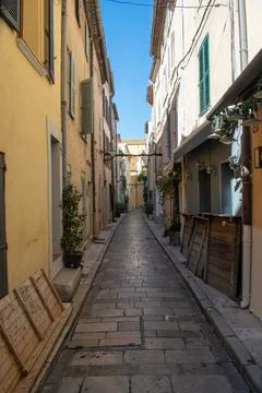 Saint Trope narrow street with plants Stock Photos