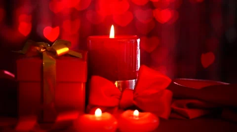 Saint Valentine's day. Romantic date. Scene with hearts and burning candles Stock-Footage 50057544