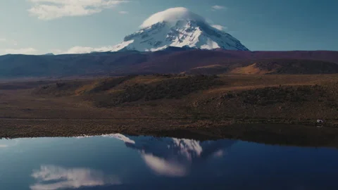 Sajama Volcano and its reflection in Lake Stock Footage 270339761