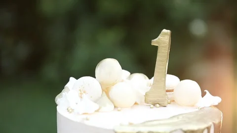 Сake with the number one for the first birthday Stock Footage 132896895