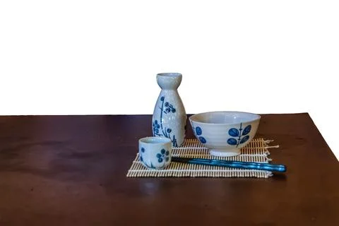 Sake set on bamboo mat Stock Photos