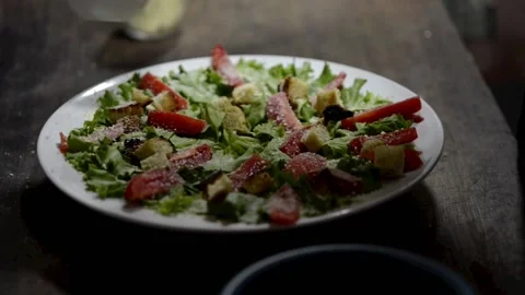 Salad appetizer preparation in restaurant Stockbeeldmateriaal 169606703