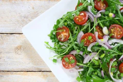 Salad with arugula Stock Photos