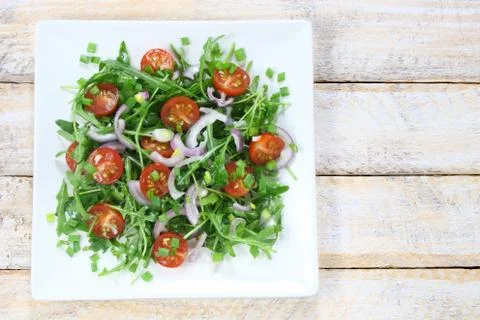 Salad with arugula Stock Photos