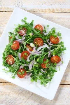 Salad with arugula Stock Photos