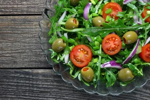 Salad with arugula Stock Photos