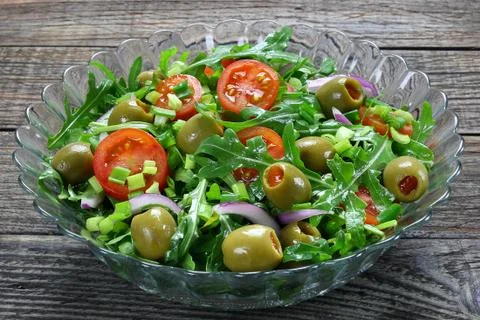 Salad with arugula Stock Photos