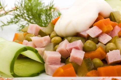 Salad with assorted greens, fried pork, carrots, croutons, parmesan cheese, and Stock Photos