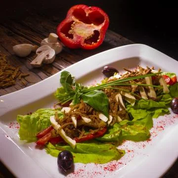 Salad from aubergine,mozzarella and tomato with basil Foto stock