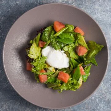 Salad with avocado, salmon, string beans. Top view Stock Photos