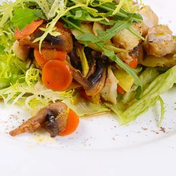 Salad from baked carrots with vegetables Stock Photos