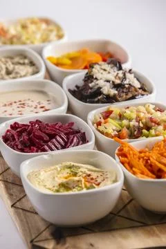 Salad bar middle eastern/Arab salads humus tahini salad	israeli food arab food Stock Photos