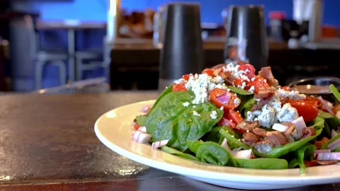 Salad on the bar table Stock Footage 131919524