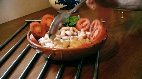 Salad of beans and tomatoes.Typical Italian dish. Stock Footage 59643775