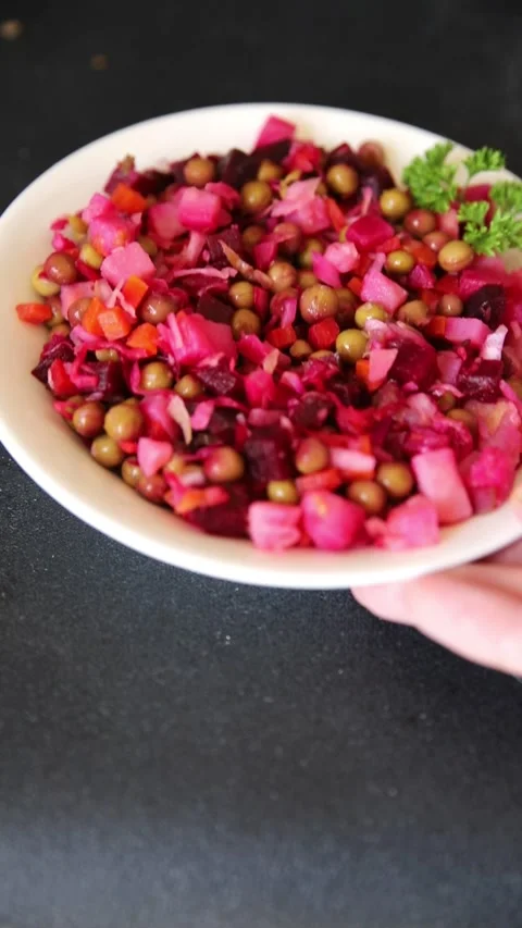 Salad beetroot and vegetables meatless dish beet, cabbage, onion, green peas Vidéo 344990928
