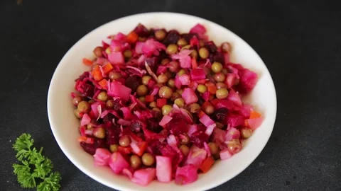 Salad beetroot and vegetables meatless dish beet, cabbage, onion, green peas Vidéo 344990930