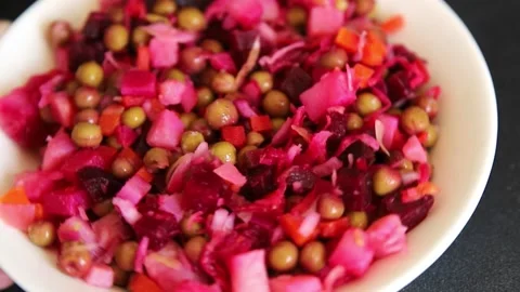 Salad beetroot and vegetables meatless dish beet, cabbage, onion, green peas Vidéo 344990939