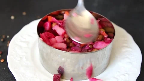 Salad beetroot and vegetables meatless dish beet, cabbage, onion, green peas Video stock 346398538