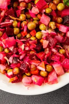 Salad beetroot and vegetables meatless dish beet, cabbage, onion, green pea.. Stock Photos