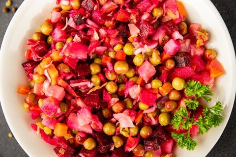 Salad beetroot and vegetables meatless dish beet, cabbage, onion, green pea.. Stock Photos
