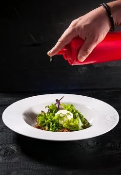 Salad on a black background Stock Photos