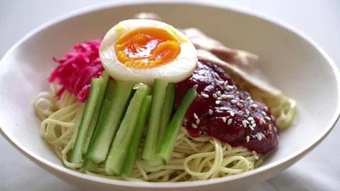 Salad with boiled egg, beetroot, and vegetables on a plate Stock Photos