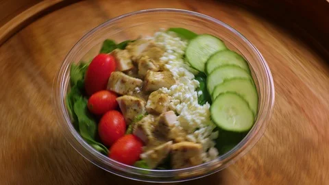 Salad Bowl with Cheese, Cucumber, Chicken, Tomatoes, Lettuce Stock Footage